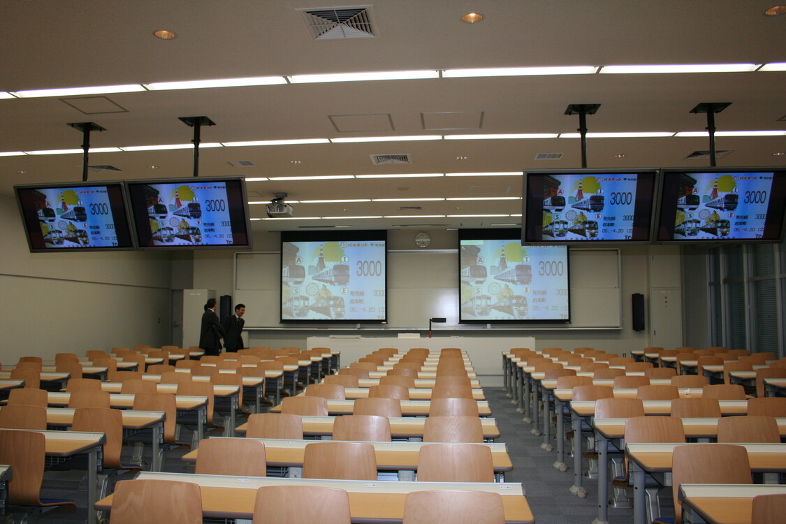 WolfVision Visualizer installed on a lectern at Meiji University