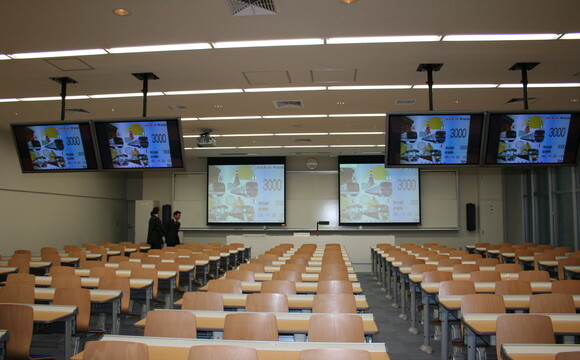 WolfVision Visualizer installed on a lectern at Meiji University