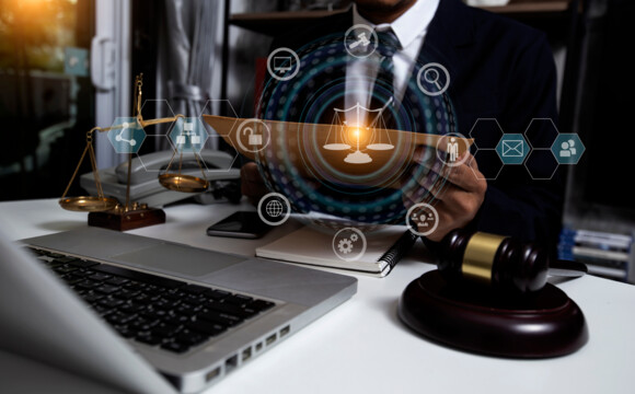 stock-photo-justice-and-law-concept-lawyer-businessman-working-with-tablet-and-laptop-on-table-office-law-1768039316
