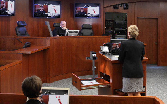 Enabling both in-person and remote participation in the court proceedings.