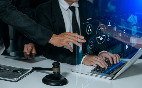 stock-photo-law-and-legal-services-concept-lawyer-man-working-with-digital-law-interface-icons-at-table-office-2024048123
