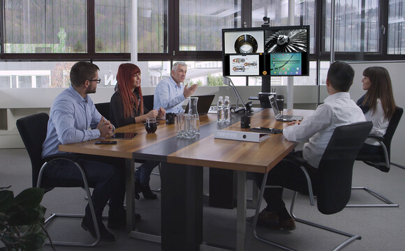 Wireless presentation technology in use in a meeting room